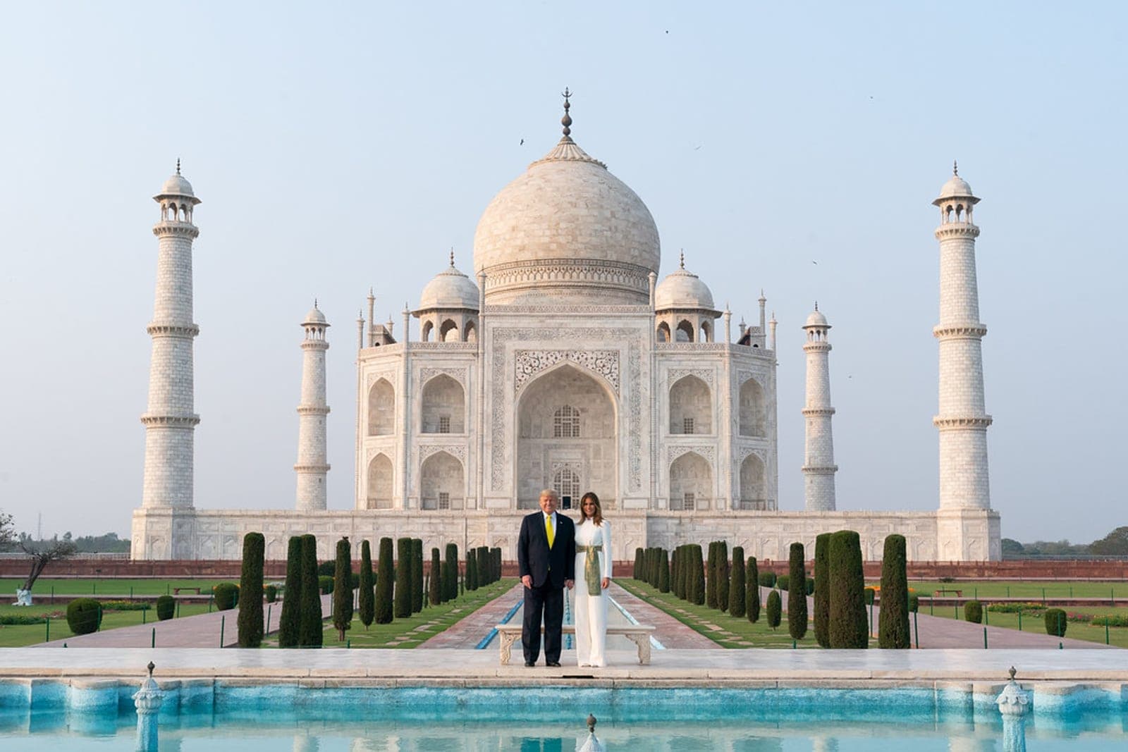The Taj Mahal in early morning light with the reflecting pool in front